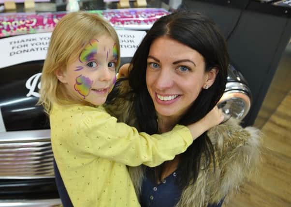 Zoe Crowson and daughter Phoebe , five