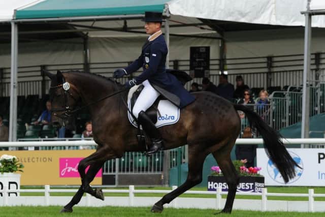 Michael Jung (GER) riding FISCHERROCANA FST; during the dressage of The Land Rover Burghley Horse Trials near Stamford in Lincolnshire, UK, on 4th September 2015 EMN-150509-110020001