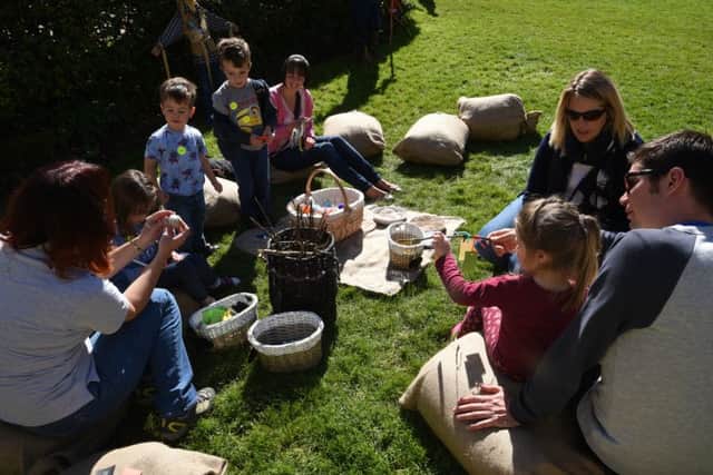 Harvest Festival at Sacrewell Farm. Children taking part in activities EMN-150927-165804009