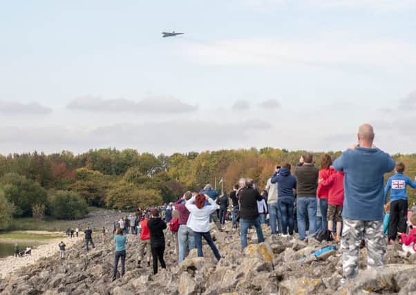Hundreds watch the last flight of the XH558 Vulcan at Rutland Water. Photo: Lee Hellwing EMN-151210-113424001