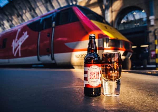 Virgin Trains on the east coast is celebrating the release of its new on board ale, Hop on Board, with a bespoke Hoptimist pint glass.   Copyright: © Mikael Buck / Virgin Trains