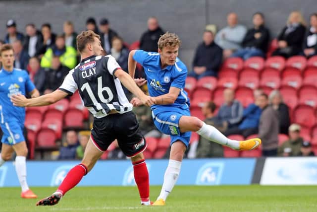 Kieran Sadlier scoring for Posh in a pre-season friendly at Grimsby. Photo: Joe Dent/theposh.com