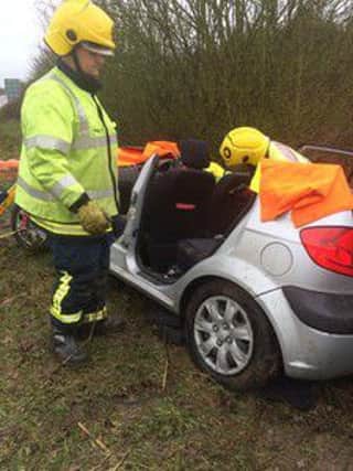 Fire crews had to cut the roof off this Hyundai to free its occupant