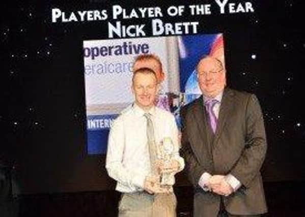 Nicky Brett receives the Players Player of the Year award.