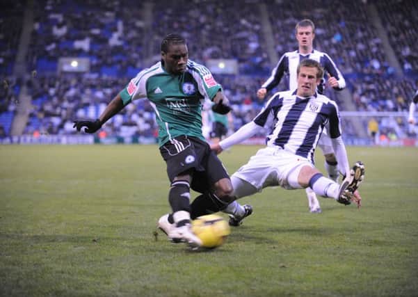 Posh striker Aaron Mclean in action in an FA Cup tie at West Brom in 2009.