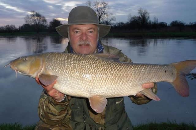 Mark Smith with his 13lb 1oz barbel.