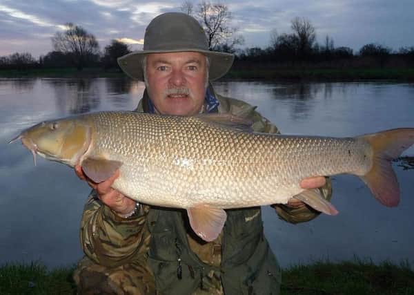 Mark Smith with his 13lb 1oz barbel.
