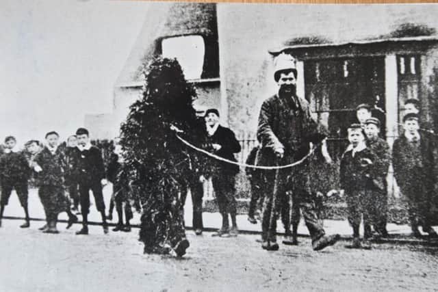 An early picture of the Straw Bear.  Can anyone date this photograph?