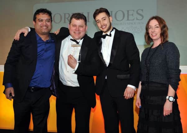 A flashback to the 2015 Footwear Industry Awards with James North (second left) with the companys Paul Luesby, second right, collecting their mens independent retailer of the year accolade from awards officials.