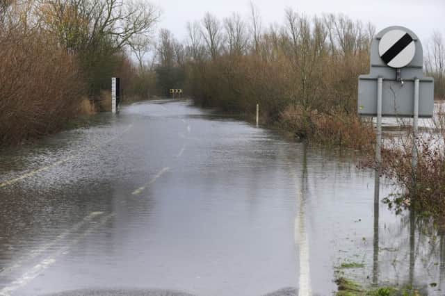 Hign Water Levels have closed the A1101 at Welney Village ANL-160115-084311009