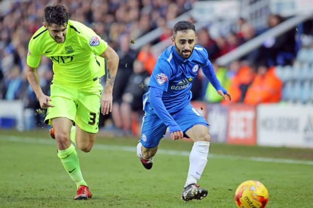 Posh sponsors' man-of-the-match Erhun Oztumer races clear of Southend left-back Stephen Hendrie. Photo: Joe Dent/theposh.com.