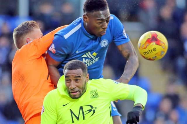 Posh centre-back Ricardo Santose challenges Southend pair Dan Bentley (goalkeeper) and Tyrone Barnett. Photo: Joe Dent/theposh.com.