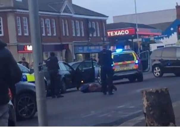 Armed police arrest a man in Lincoln Road, Peterborough