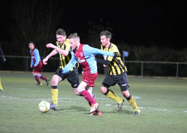 Scott Coupland in action for Deeping Rangers.