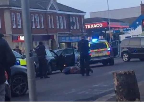 Armed police arrest a man in Lincoln Road, Peterborough