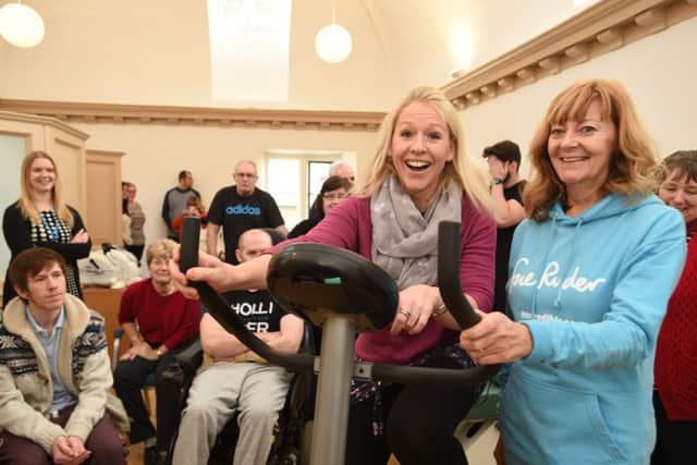 Opening of the new gym at Thorpe hall by Olympic medalists in badminton  Gail Emms. She is pictured with hospice volunteer Kim Elliott EMN-160118-145923009