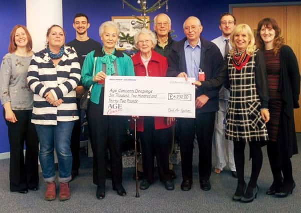 Photo; The Park Air cheques being received by (holding cheque L-R) Brenda Hurl, Beattie Randall, Peter Hubbard  (behind) and Bob Parmenter EMN-160118-143141001