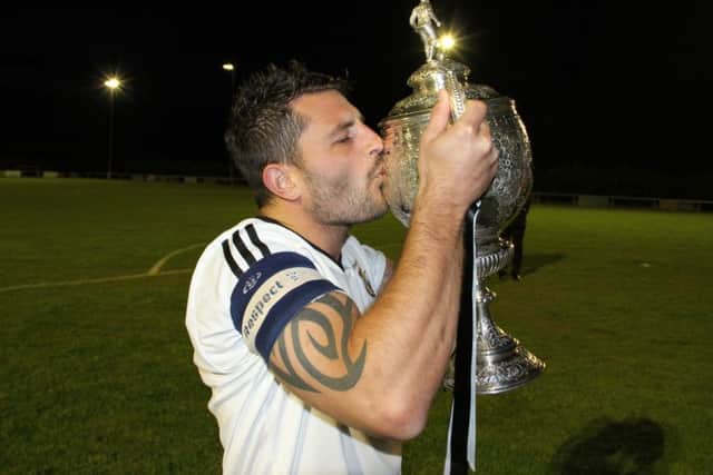 Phil Stebbing, seen here lifting the Hinchingbrooke Cup for Peterborough Northern Star, could make his first appearance of the season for Yaxley.
