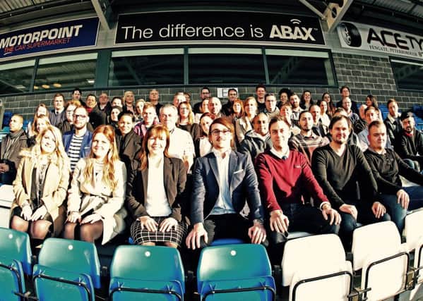 The Abax team at their new home - the Peterborough United stadium.