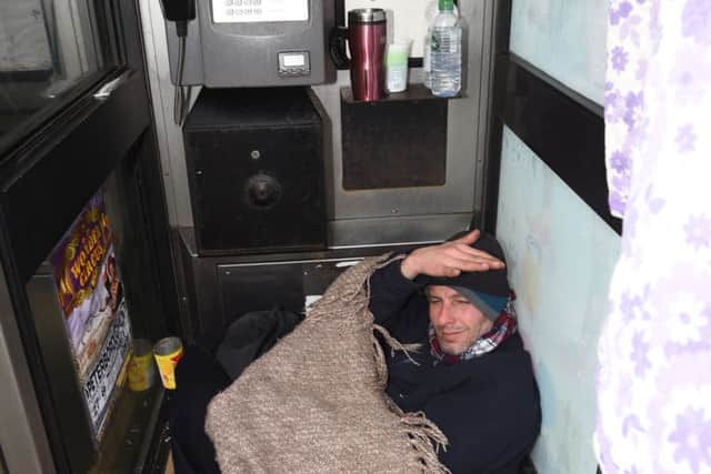 Man living in telephone box at Gladstone Street EMN-160122-100613009