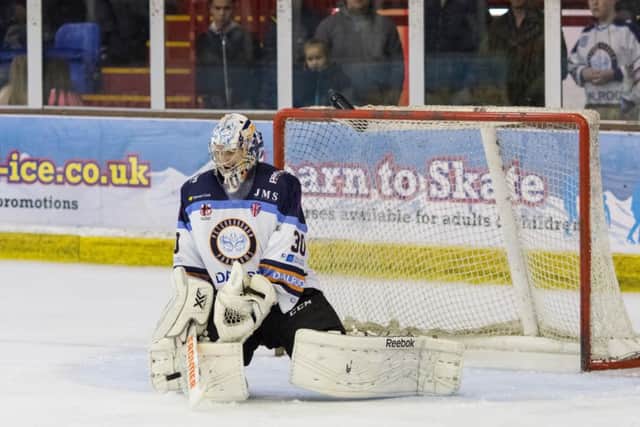 Adam Long makes a save for Peterborough Phantoms against Bracknell. Photo: Tom Scott.
