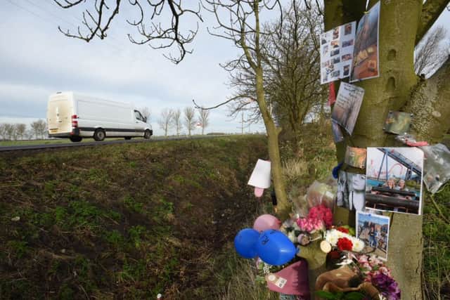 Tributes left at the side of the road for Emma