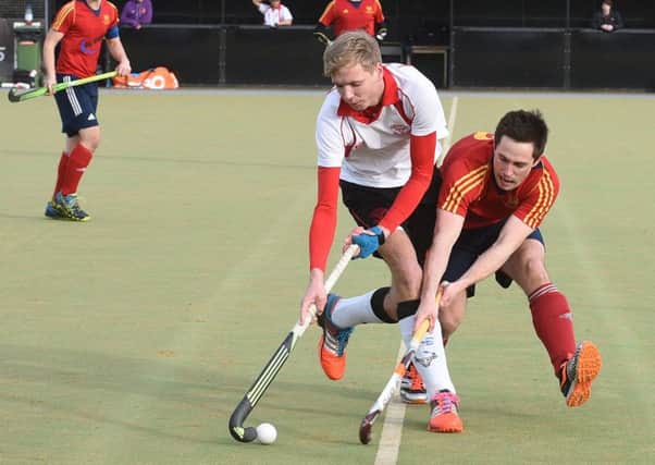 Alex Armstrong (red) in action for City of Peterborough (red) against Havering at Bretton Gate. Photo: David Lowndes.