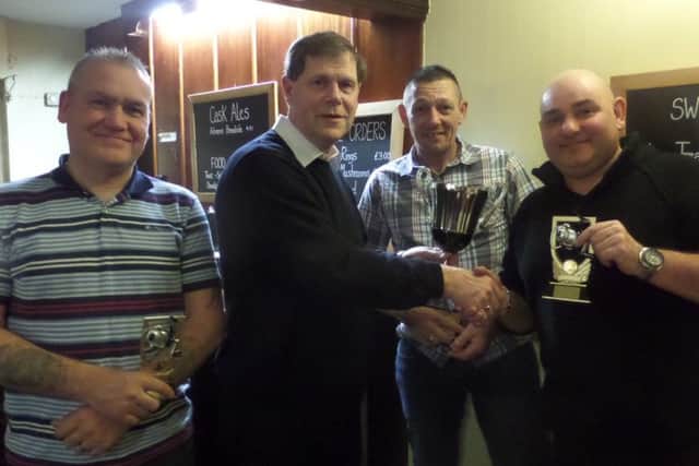 Ken Wade presented the prizes at the Cock Inn Angling Club presentation night. Club champion once again was Steve Smith, who took five match wins and two seconds for a total of 191 points. Gary Sell was runner-up position with 181 (1 win and 7 seconds) followed by Bob Mills on 178 (4 wins and 1 second). From the left are Gary Sell, Ken Wade, Bob Mills and Steve Smith.