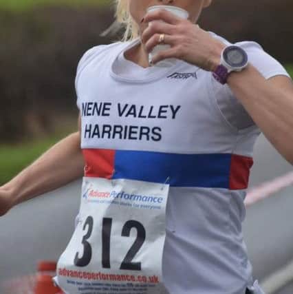 Tracey McCartney takes on some refreshment.
