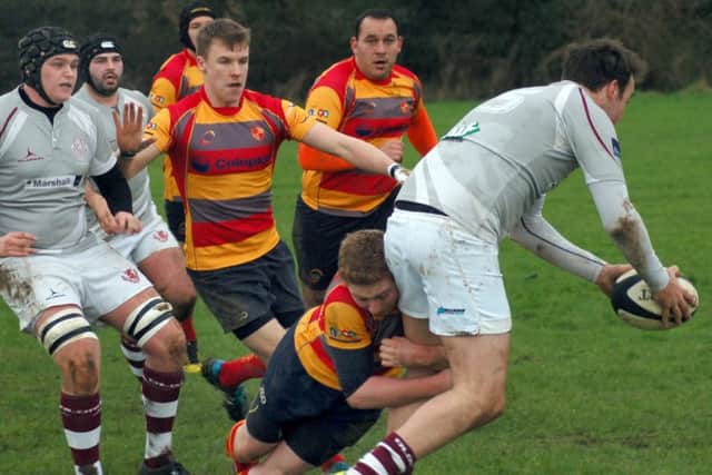 Mark Matthews goes over for Melton's opening try against Peterborough.