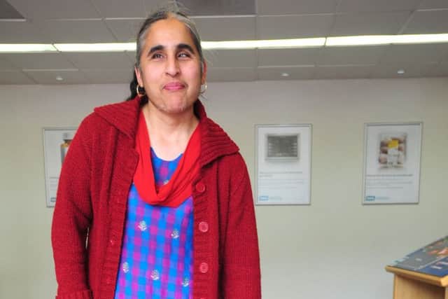 Kawal Gucukoglu, who is worried that the potential loss of her disability benefit may mean the loss of her independence. Pictured with her guide dog Ursa ENGEMN00120120518164843