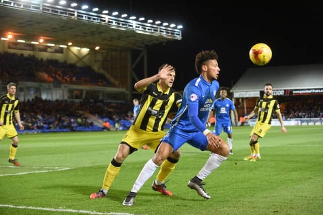 Posh substitute Lee Angol in action against Burton. Photo: David Lowndes.