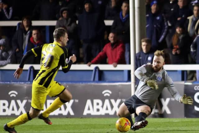 Posh man-of-the-match Ben Alnwick in action against Burton. Photo: Joe Dent/theposh.com.