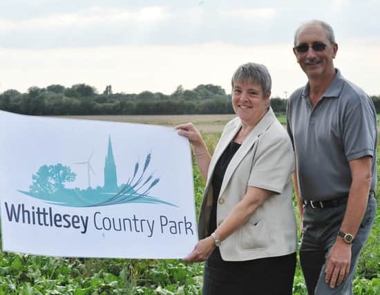 The Whittlesey Country Park  team members  -   Martin Whitwell (chairman), Julie Shortland (secretary  with the logo EMN-140209-211846009