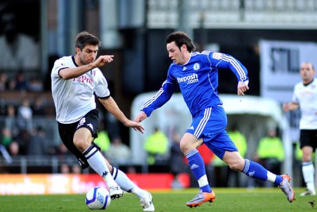 Lee Tomlin in action for Posh at Fulham in an FA Cup tie in 2011. Posh lost 6-2, but Tomlin scored.