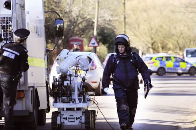 Police and bomb disposal experts remain at the doctorsÃ¢Â¬" surgery in Boughton Village, after suspicious packages were discovered there this morning.Officers were called to the Boughton surgery in Chapel Road shortly before 7.30am today after the packages were found. ANL-160128-141820009