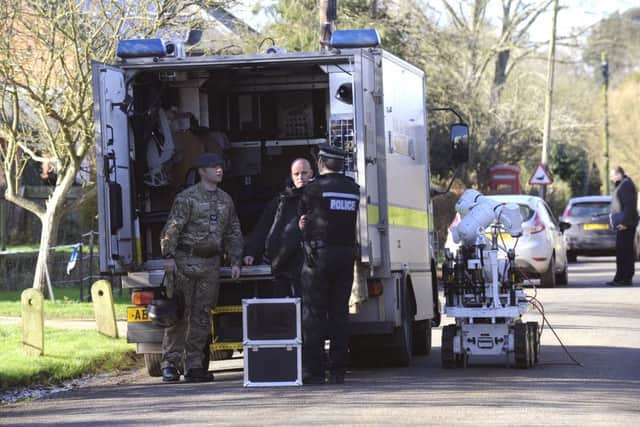 Police and bomb disposal experts remain at the doctorsÃ¢Â¬" surgery in Boughton Village, after suspicious packages were discovered there this morning.Officers were called to the Boughton surgery in Chapel Road shortly before 7.30am today after the packages were found. ANL-160128-141905009