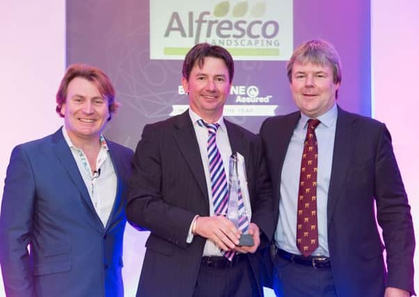 Alastair Peat, director of Alfresco Landscaping with host and TV personality, David Domoney, and Bradstones commercial director, Toby Stuart-Jervis EMN-160402-163700001