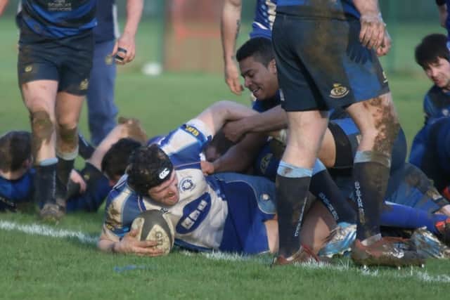 Sam Crooks completes his hat-trick of tries for the Lions against Syston. Picture: Mick Sutterby