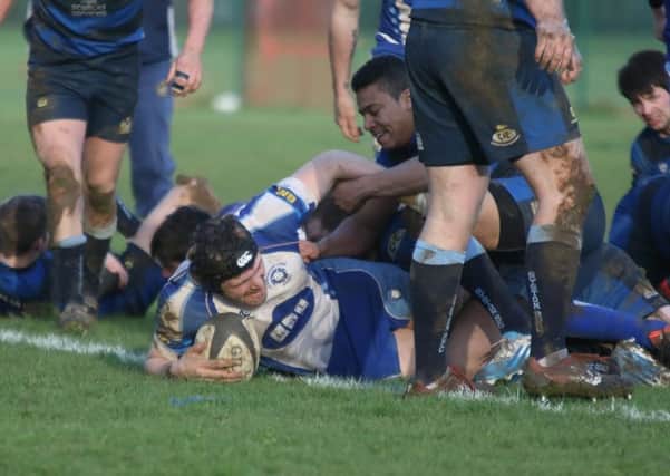 Sam Crooks completes his hat-trick of tries for the Lions against Syston. Picture: Mick Sutterby
