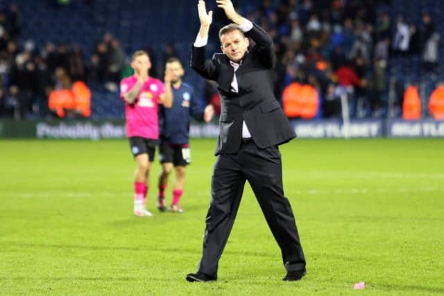 Posh manager Graham Westley acknowledges the travelling fans after the draw at West Brom. Photo: Joe Dent/theposh.com.