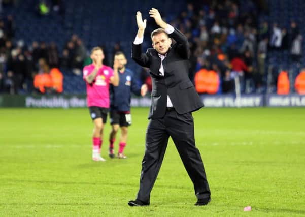 Posh boss Graham Westley applauds the club's fans after the 2-2 draw with West Brom.