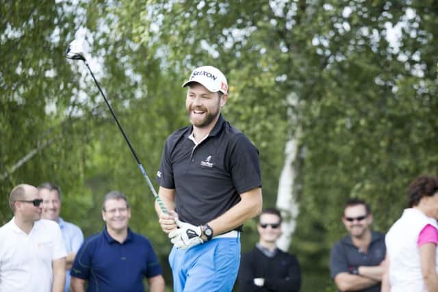 Brian McFadden tries a trickshot and fails. Action Medical Research Tony Hadley Golf Classic, Elton Furze, Peterborough 12/09/2015.  Picture by Terry Harris. THA