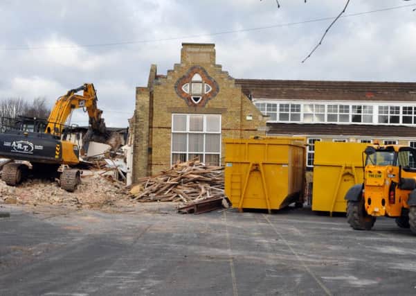 CHANGING LANDSCAPE: Excavators on sight at the old South View Community Primary School, Reform Street, Crowland, where demolition work is under way.  Photo by Tim Wilson.