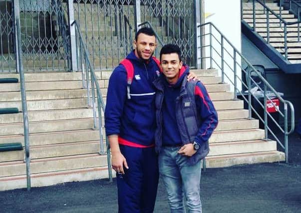 Lewis Harvey with Courtney Lawes