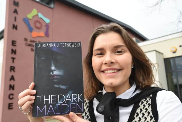 St John Fisher student Adrianna Tetnowski with her book EMN-160302-163607009