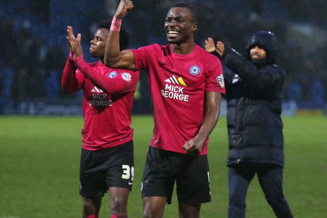 Posh substitute Gaby Zakuani salutes his side's fans after the 1-0 win at Chesterfield. Photo: Joe Dent/theposh.com.