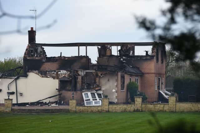 The aftermath of the house fire near Thorney. Photo: David Lowndes