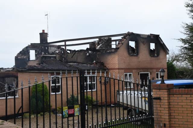 The aftermath of the house fire near Thorney. Photo: David Lowndes