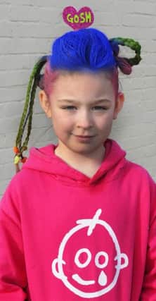 Ellena Sequerah-Salmon takes part in a big hair fundraiser at Burrowmoor Primary School in March to thank Great Ormond Street Hospital for helping to save her life.